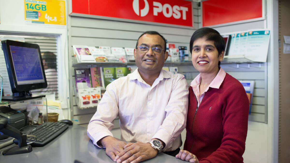Windsor South post pffice owners Kumie and Daya Govender. The business was named Australia Post Retail Rewards top post office in the country. Picture: Geoff Jones