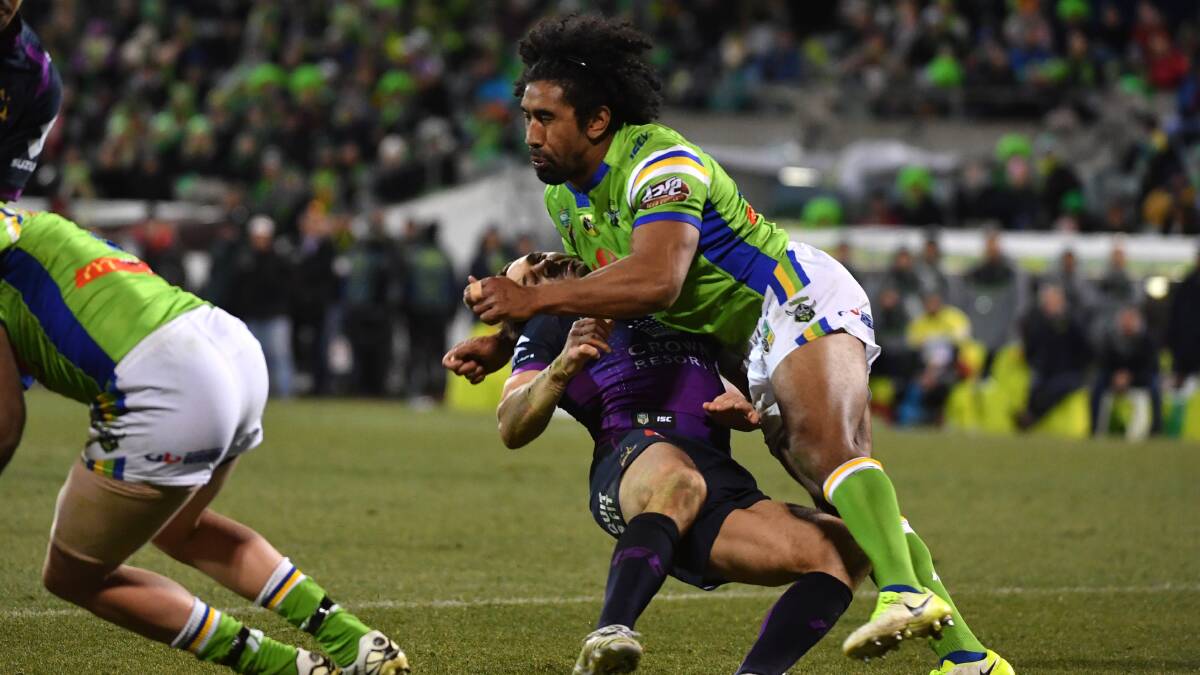 THE HIT: Sia Soliola hits Billy Slater during the round 20 match between the Canberra Raiders and the Melbourne Storm. Picture: AAP Images