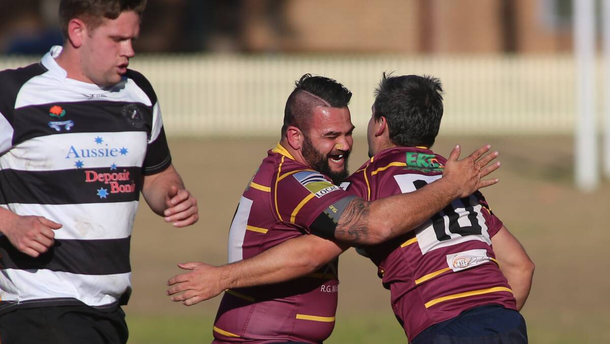 Hawkesbury Ag College players celebrate a try scored during the season. Picture: Geoff Jones