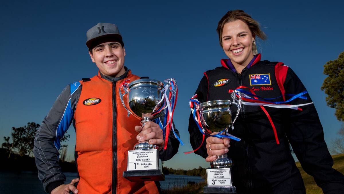 Lochie and Louise Vella hold their Australian Formula Powerboat Grand Prix trophies. Picture: Geoff Jones