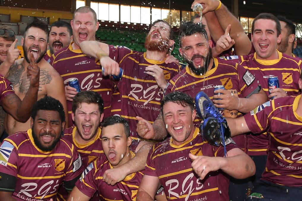 FIRED UP: Hawkesbury Ag College players celebrate defeating Hunters Hill in the Barraclough Cup grand final in NSW Suburban Rugby Union competition. Picture: Geoff Jones
