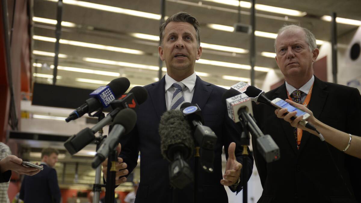 Transport Minister Andrew Constance Sydney Trains CEO Howard Collins front the media on January 19. Picture: Nick Moir/Fairfax Media