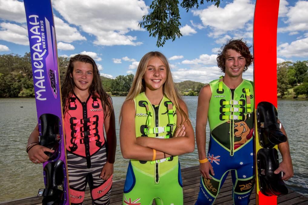Hawkesbury water skiers Haylee Gibson with Nellie and Brock McMillan, who all competed at the Australian Speed and Marathon water skiing titles at Jindabye last week. Picture: Geoff Jones