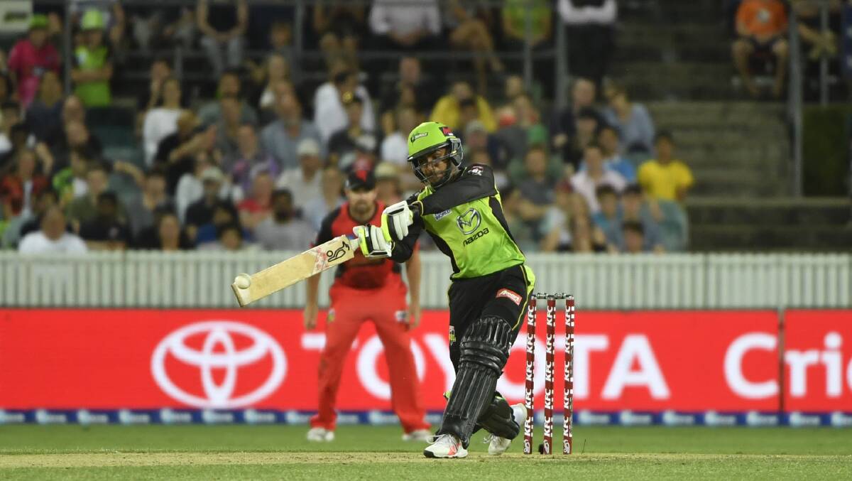 Arjun Nair hits one of three sixes he recorded against the Melbourne Renegades on January 24. Picture: AAP image/Sean Davey