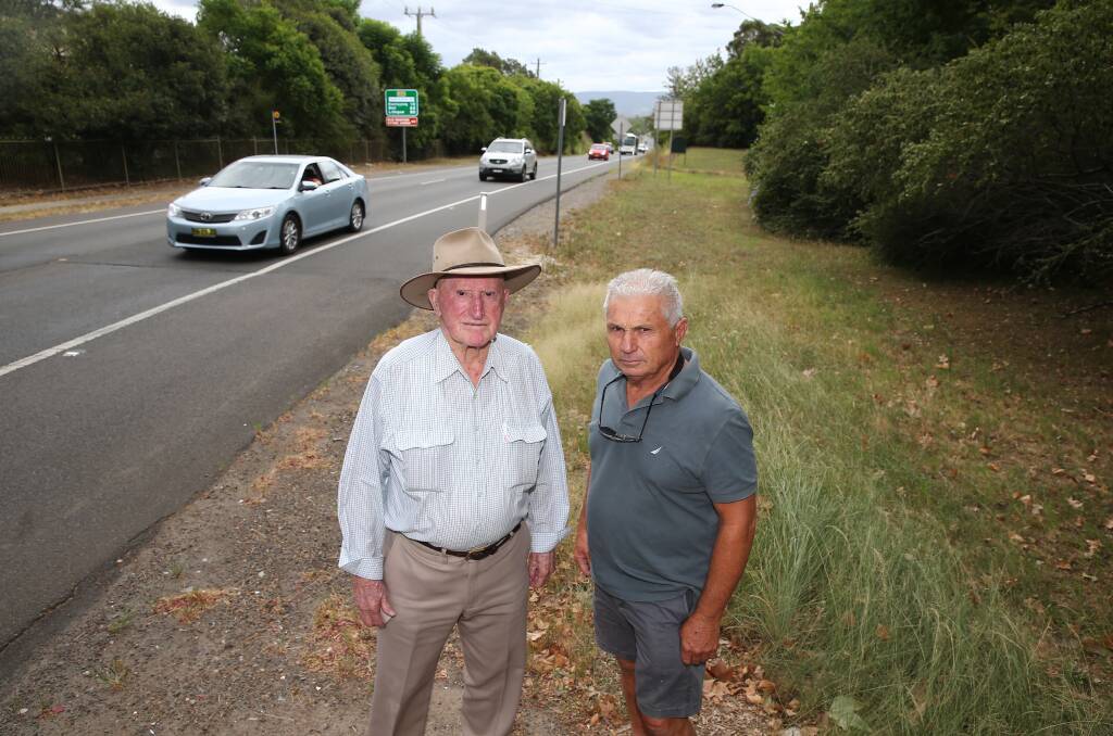 Second crossing: John Miller and floodplain committee member Maurie Smith on the corner of Kurrajong and Chapel Roads, Richmond, where there has been a proposal for a second bridge. Picture: Geoff Jones.