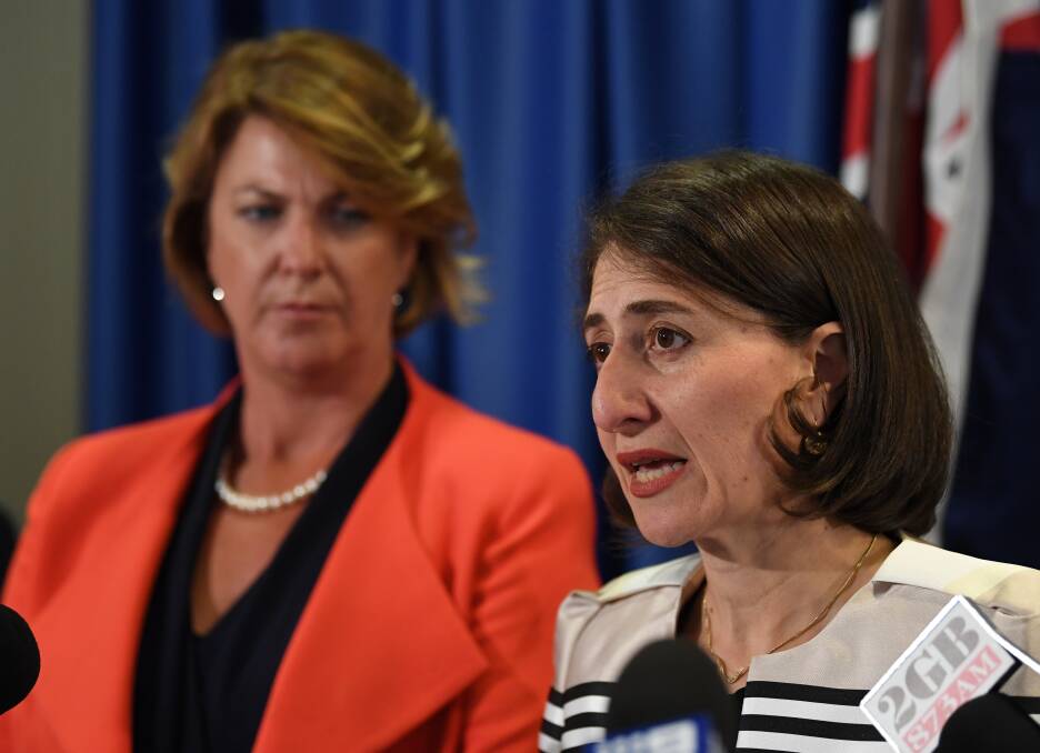 NSW Premier Gladys Berejiklian announces new road safety measures, flanked by Roads Minister Melinda Pavey. Picture: AAP Image/David Moir