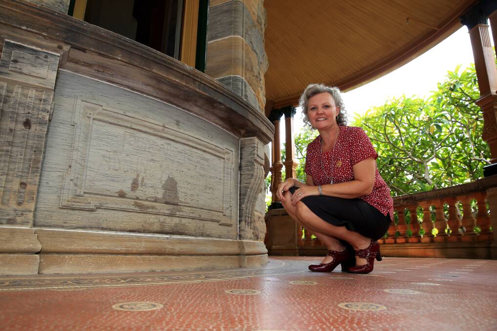 Time capsule: Tania Hoinville at the Belmont House Foundation Stone. A time capsule is believed to be located behind the stone. Pictures: Geoff Jones.