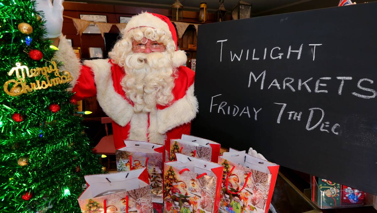 FESTIVE CHEER: Santa promoting the upcoming Twilight Markets at Australian Pioneer Village. Picture: Geoff Jones