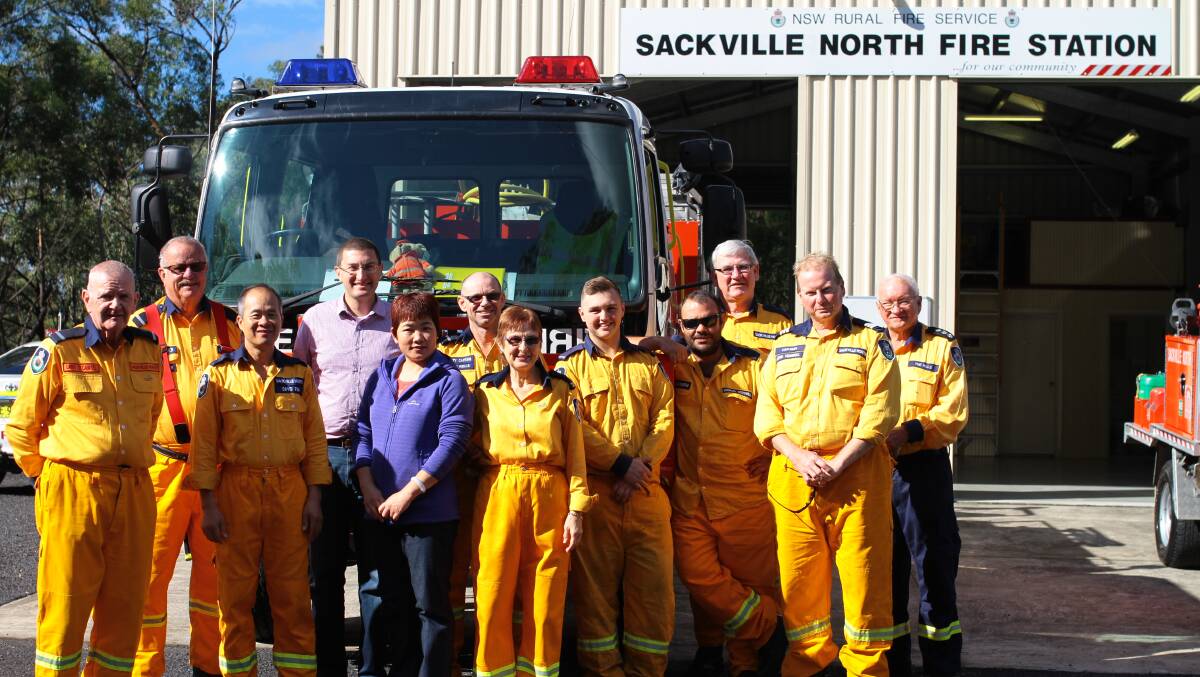 Volunteers: Berowra MP Julian Leeser visiting Sackville North RFS, the type of group that would be eligible for the scholarship. 
