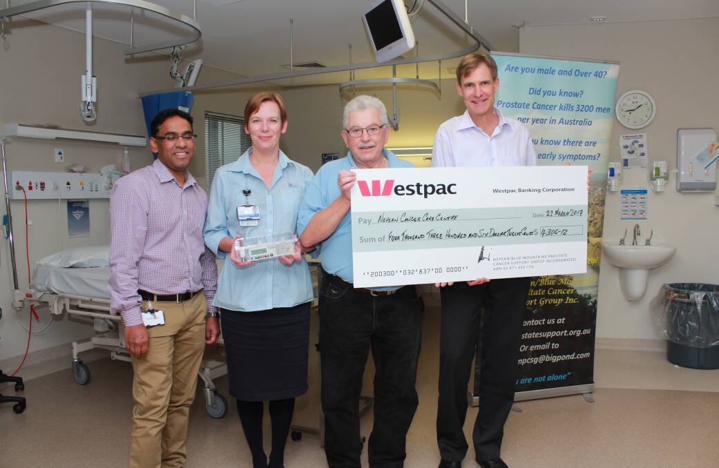 Donation: Nepean Hospital staff specialist Dr Zujaj Quadri, transitional nurse practitioner in palliative care Rebecca Palmer holding a Niki pump, Nepean Blue Mountains Prostate Cancer Support Group president David Wilkinson, and staff specialist Dr Alan Oloffs.