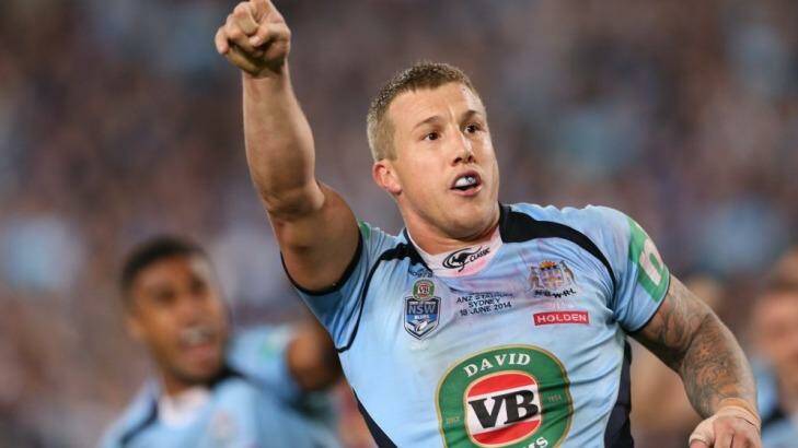 Trent Hodkinson celebrates the only try of the second State of Origin match. Photo: Anthony Johnson