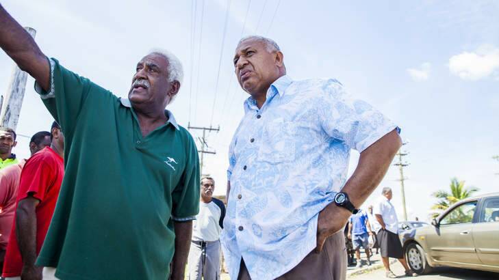 Campaign trail: Frank Bainimarama (right) is seeking Fijian votes. Photo: Shiri Ram