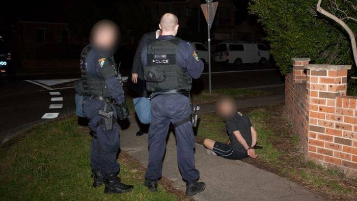 NSW Police officers execute search warrants in raids across Sydney on Thursday, September 18. Photo: NSW Police