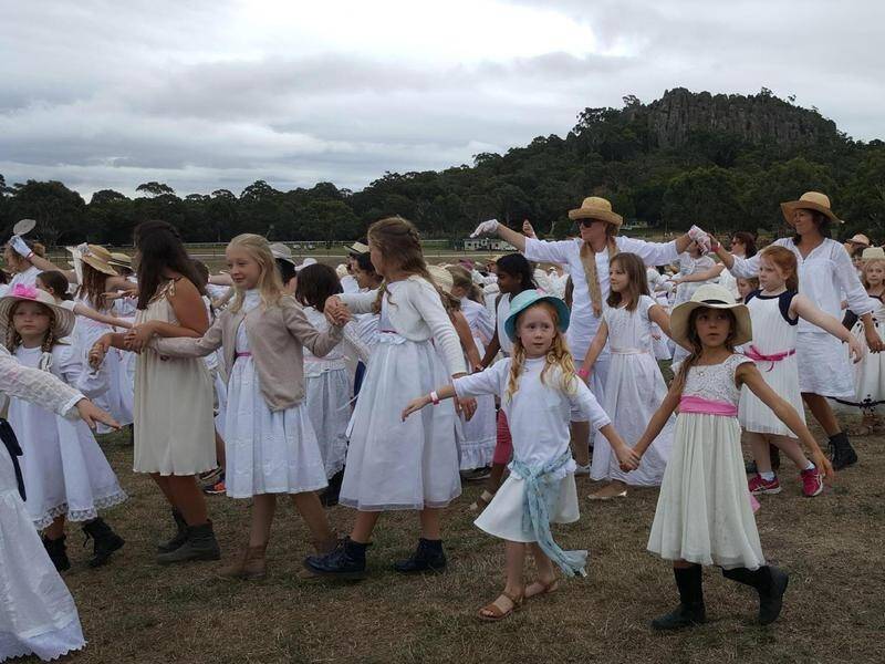 Hundreds of "Mirandas" have descended on Hanging Rock in a 50th birthday tribute to the novel.