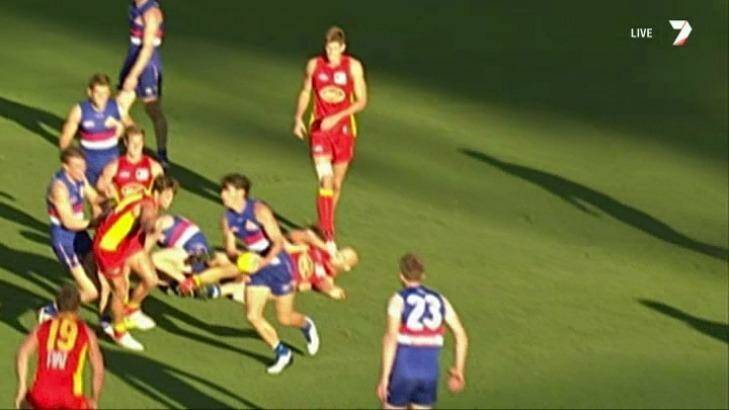 Gold Coast captain Gary Ablett could be scrutinised by the match review panel for this off-the-ball blow to Western Bulldogs' Liam Picken. Photo: Channel Seven