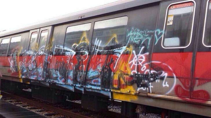 The vandalised SMRT train in Singapore that resulted in the arrest of the two Germans. Photo: Straits Times