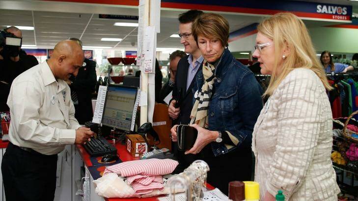 Trash to treasure: Mrs Abbott at the op shop checkout.  Photo: Daniel Munoz/Getty Images