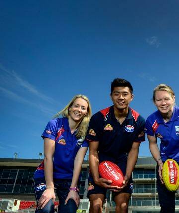 Looking forward: Western Bulldogs Women’s team and the Footscray Bulldogs VFL team members (left to right)  Lauren Arnell, Lin Jong, Aasta O’Connor and Jason Tutt welcome the boost to Whitten Oval.  Photo: Penny Stephens