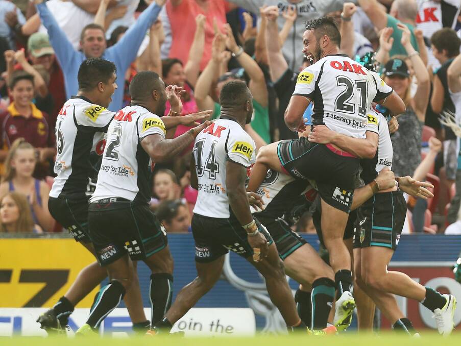 SYDNEY, AUSTRALIA - MARCH 22:  Matthew Moylan of the Panthers celebrates with team mates after kicking a conversion to win the match during the round three NRL match between the Penrith Panthers and the Canterbury-Bankstown Bulldogs at Sportingbet Stadium on March 22, 2014 in Sydney, Australia.  (Photo by Mark Metcalfe/Getty Images) panthers team,2014 Pic: getty images