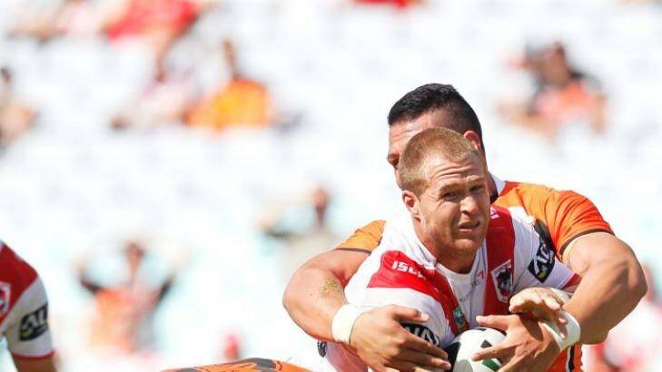 Digging in: Dragons forward Jack De Belin against Wests Tigers in round one. Photo: Christopher Chan