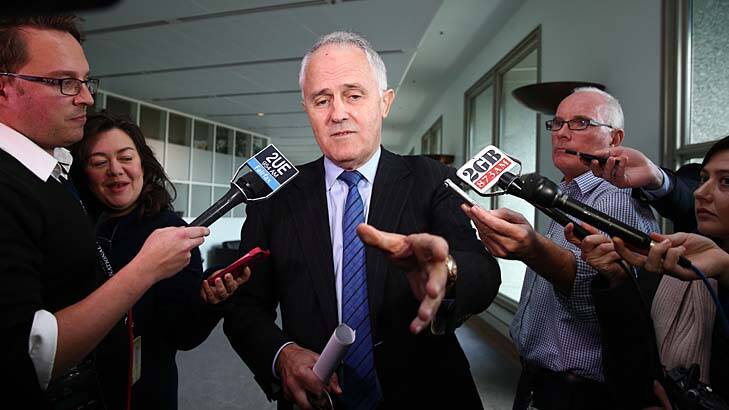 Question time: Malcolm Turnbull addresses the media in Canberra on Thursday. Photo: Alex Ellinghausen
