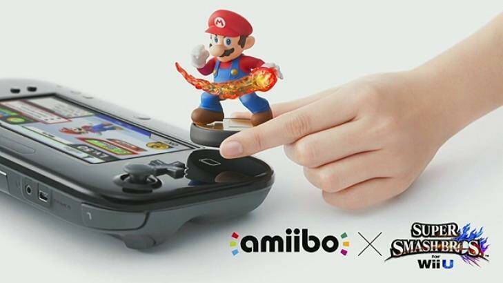 A Mario Amiibo figurine is used with <i>Super Smash Bros for Wii U</i>. Photo: Nintendo