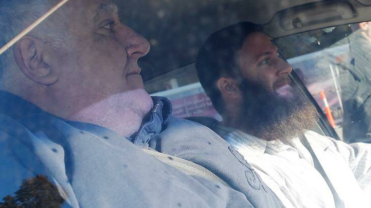 Robert 'Musa' Cerantonio, right, is driven from Melbourne Airport. The radical cleric was deported from the Philippines. Photo: Eddie Jim