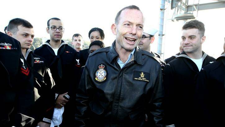 Prime Minister Tony Abbott speaks with sailors on the USS Blue Ridge in Sydney on Friday. Photo: Tim Hunter