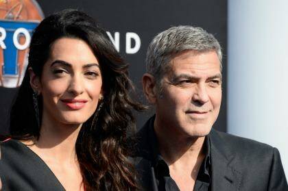 Amal and George Clooney attend the premiere of Disney's <i>Tomorrowland</i> at AMC Downtown Disney 12 Theatre in Los Angeles on May 9. Photo: Frazer Harrison