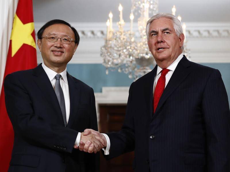 China's top diplomat has reaffirmed a commitment to pressure North Korea over nuclear weapons.