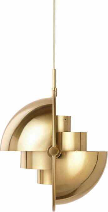 Switched on or off the Multi-Lite pendants by Gubi (pictured in brass) will add drama to any space. Available from August. $1059, cultdesign.com.au. Photo: Supplied