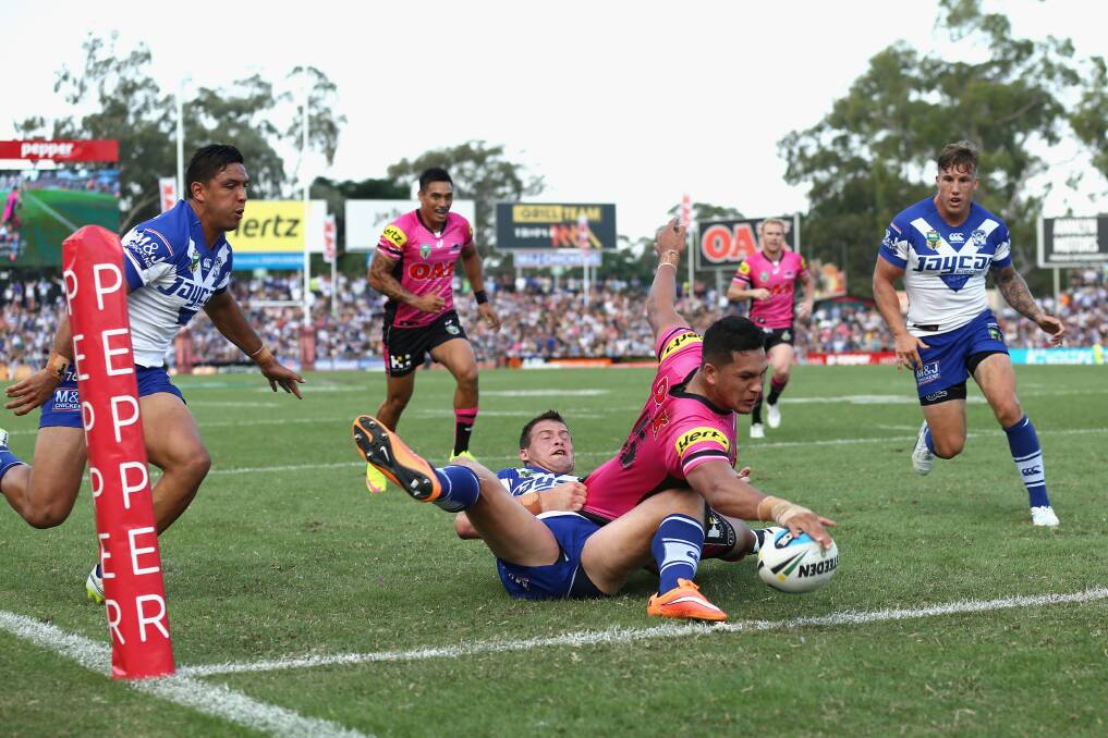 SYDNEY, AUSTRALIA - MARCH 08:  Dallin Watene-Zelezniak of the Panthers scores a try during the round one NRL match between the Penrith Panthers and the Canterbury Bulldogs at Pepper Stadium on March 8, 2015 in Sydney, Australia.  (Photo by Cameron Spencer/Getty Images) Dallin Watene-Zelezniak