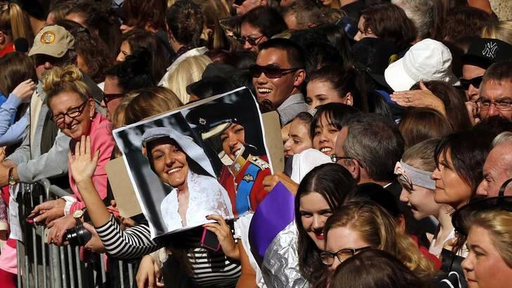 Crowds await the arrival of Catherine, the Duchess of Cambridge, and her husband Britain's Prince William outside Sydney's St Andrew's Cathedral. Photo: Reuters