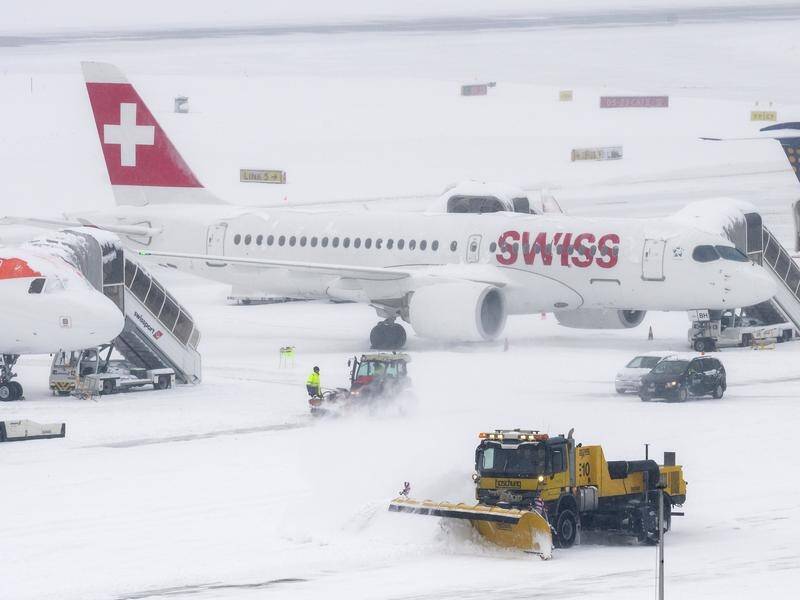 Geneva's airport closed after the Swiss city was hit with 13cm of snow over a three-hour period.