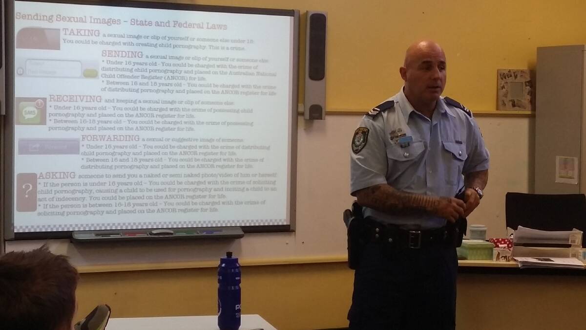 Senior Constable Jason Ruoghley during Thursday's talk at Casuarina School. Picture: Isabell Petrinic