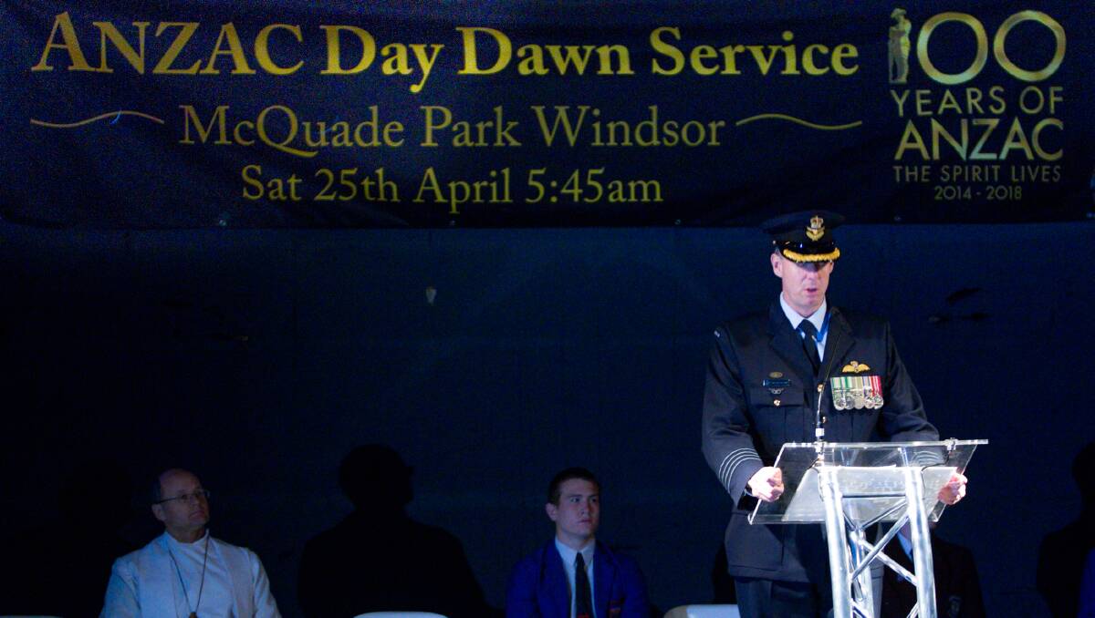 Group Captain Stewart Dowrie delivers the speech that resonated with many afterwards. Picture: Geoff Jones