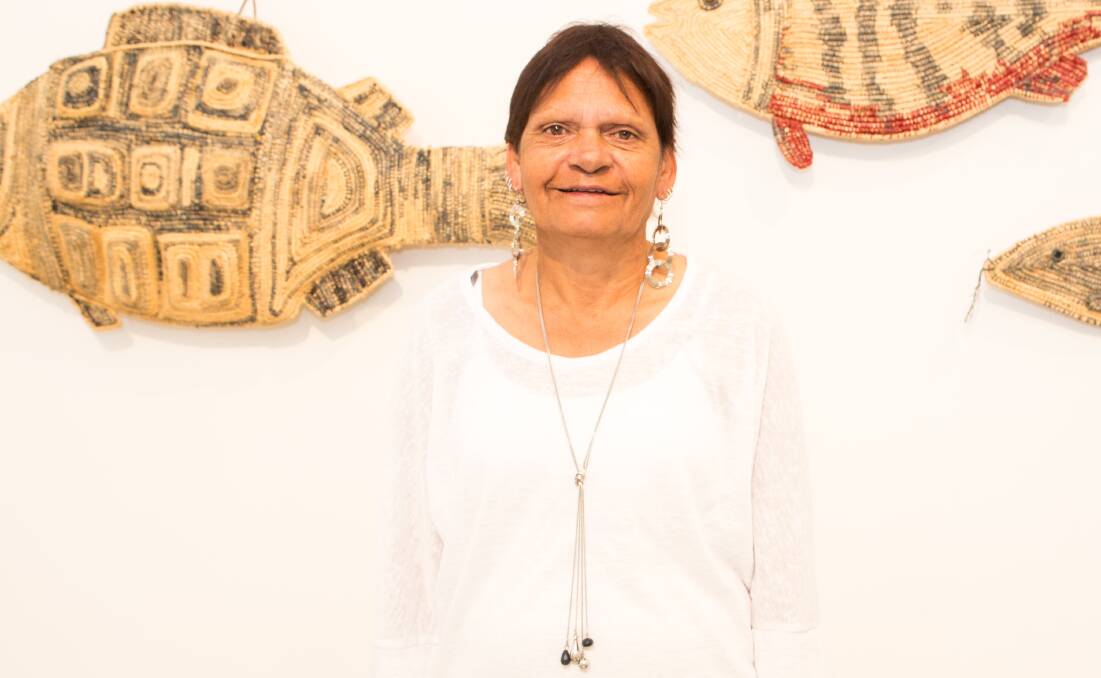 River to River:  Artist Bev Coe with her artworks in the exhibition at Penrith Regional Gallery. 