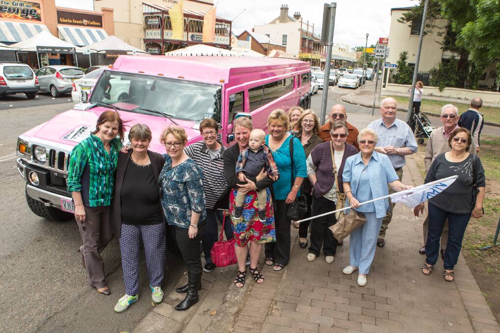 Carers alight from their extravert pink transport to Windsor. Pictures: Geoff Jones