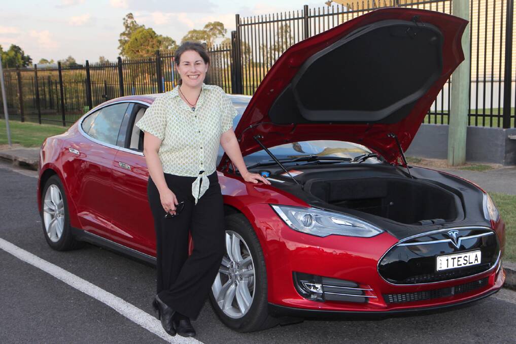 Sustainable:  Danielle Wheeler shows off the electric car with dual motors, but no engine.