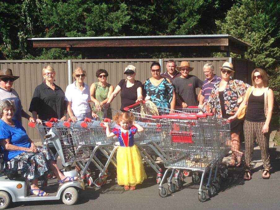 Councillor Christine Paine with Windsor residents who say they are sick of discarded trolleys littering the area.