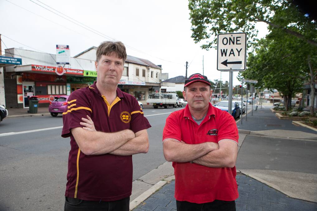 Neglected: Riverstone Chamber of Commerce president Andrew Southwell and Andrew Toirkens from Riverstone Quality Meat Market fear Garfield Road East will become a ghost town unless they get more help from Blacktown Council. Picture: Geoff Jones
