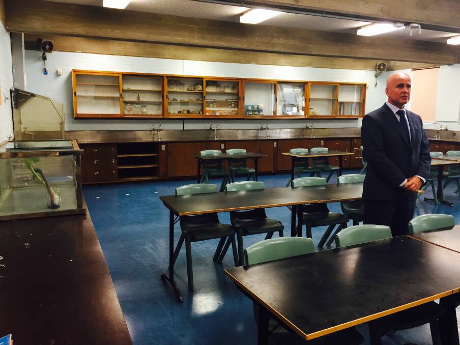Out of date:  Education Minister Adrian Piccoli in one of the two antiquated science labs at Riverstone High School. Picture: Stephanie Bates