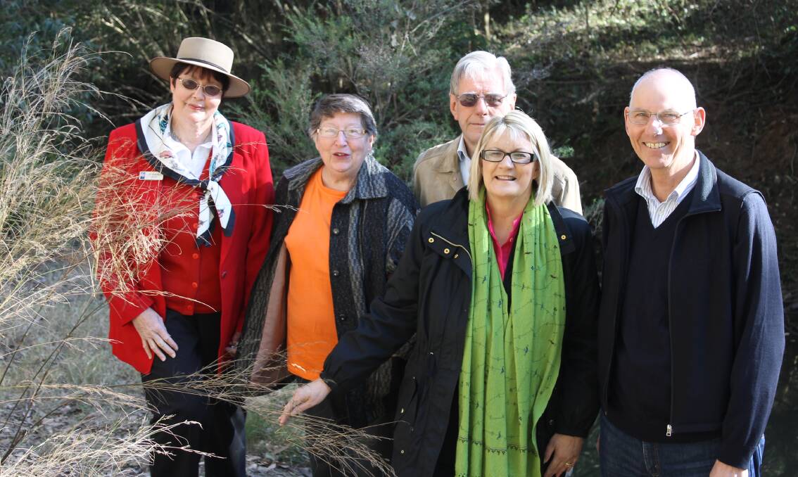 Councillor Jill Reardon, local residents Margaret and Bryan Smith, Federal Member for Macquarie Louise Markus and Hawkesbury Environment Network Chairman John Street, beside Redbank Creek at North Richmond, one of the future Green Army work sites.