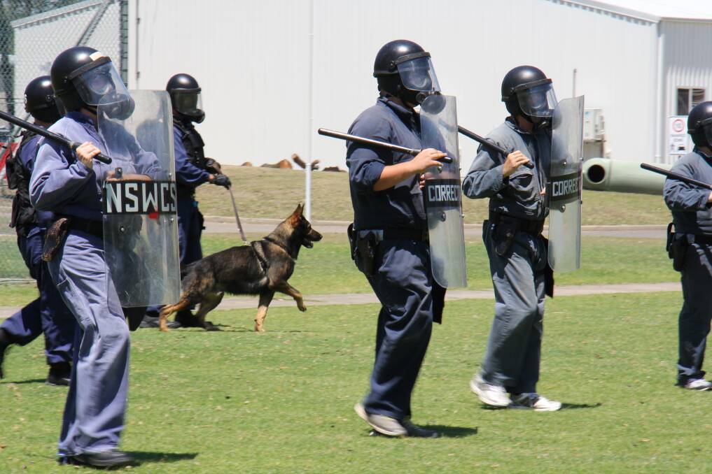 Tooled up: Correctional officer recruits are now qualified to respond to whatever situations they may face.