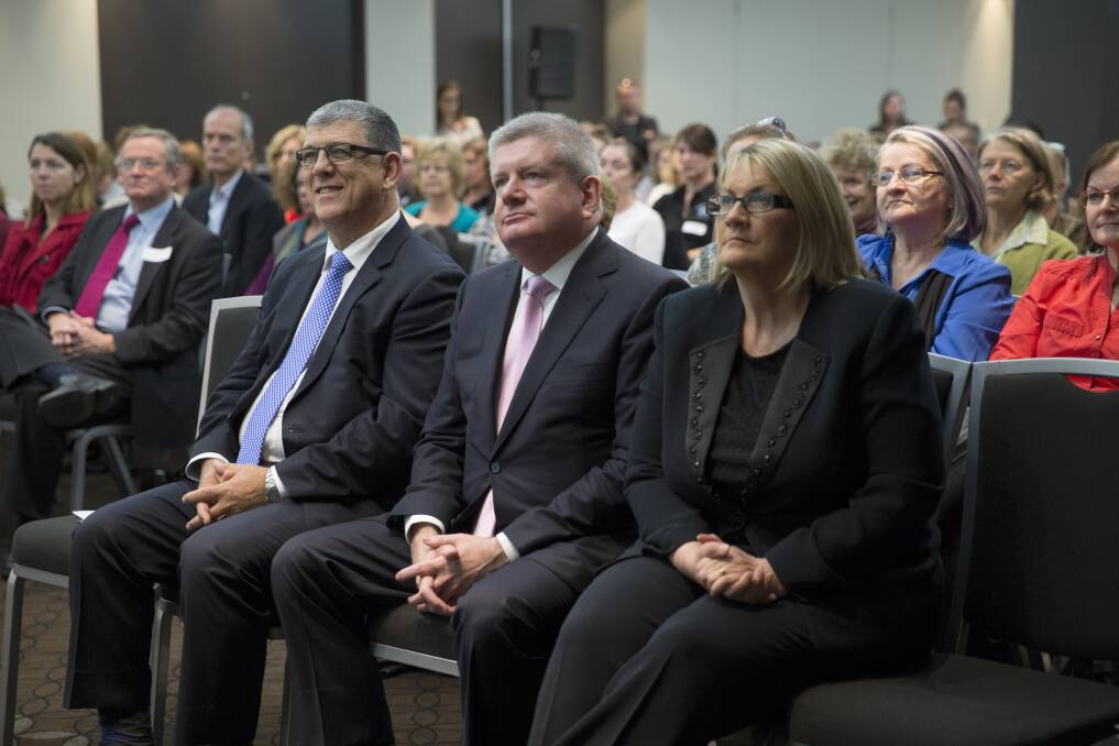 NSW Minister for Disability Services, John Ajaka and Federal Assistant Minister for Social Services, Mitch Fifield, with Macquarie MP Louise Markus, at the launch of the NDIS in Penrith. Picture: Geoff Jones