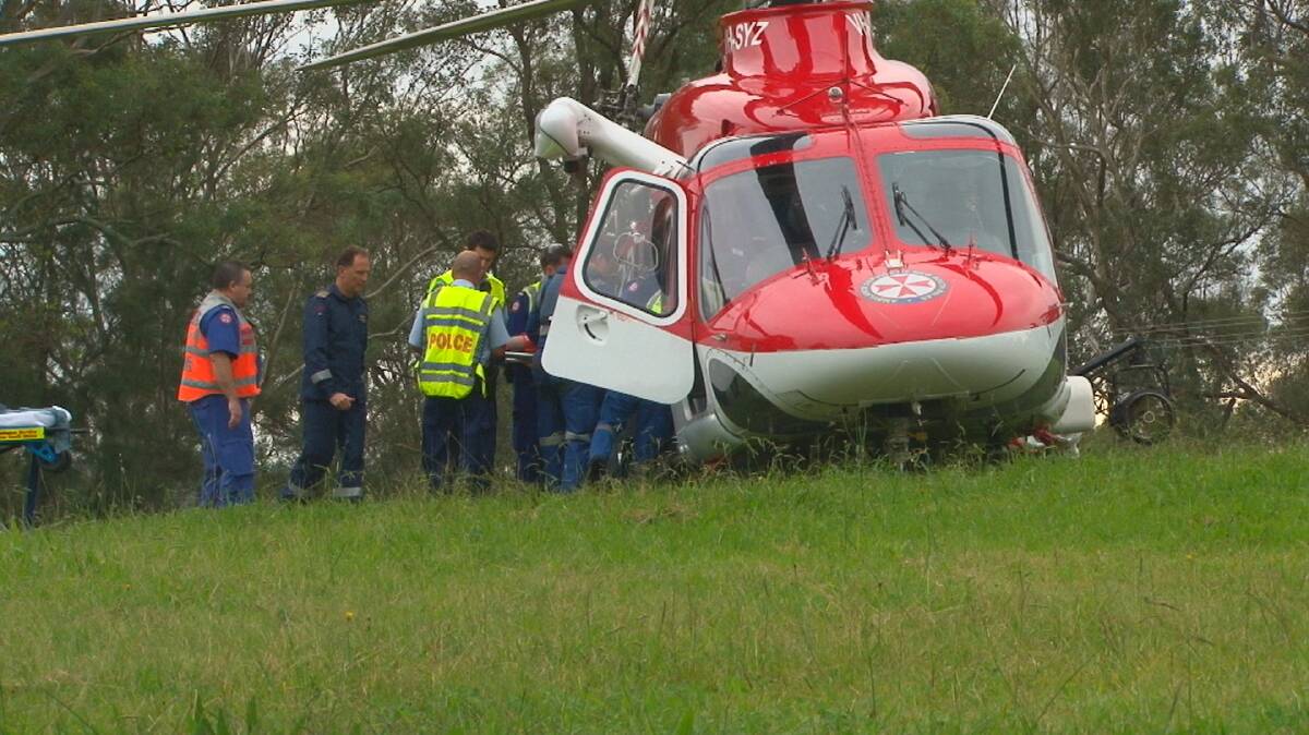 Motorbike rider being airlifted to Westmead Hospital.
Photo: Top Notch