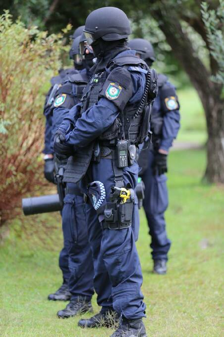 Officers ready to execute search at one of the North Richmond properties.