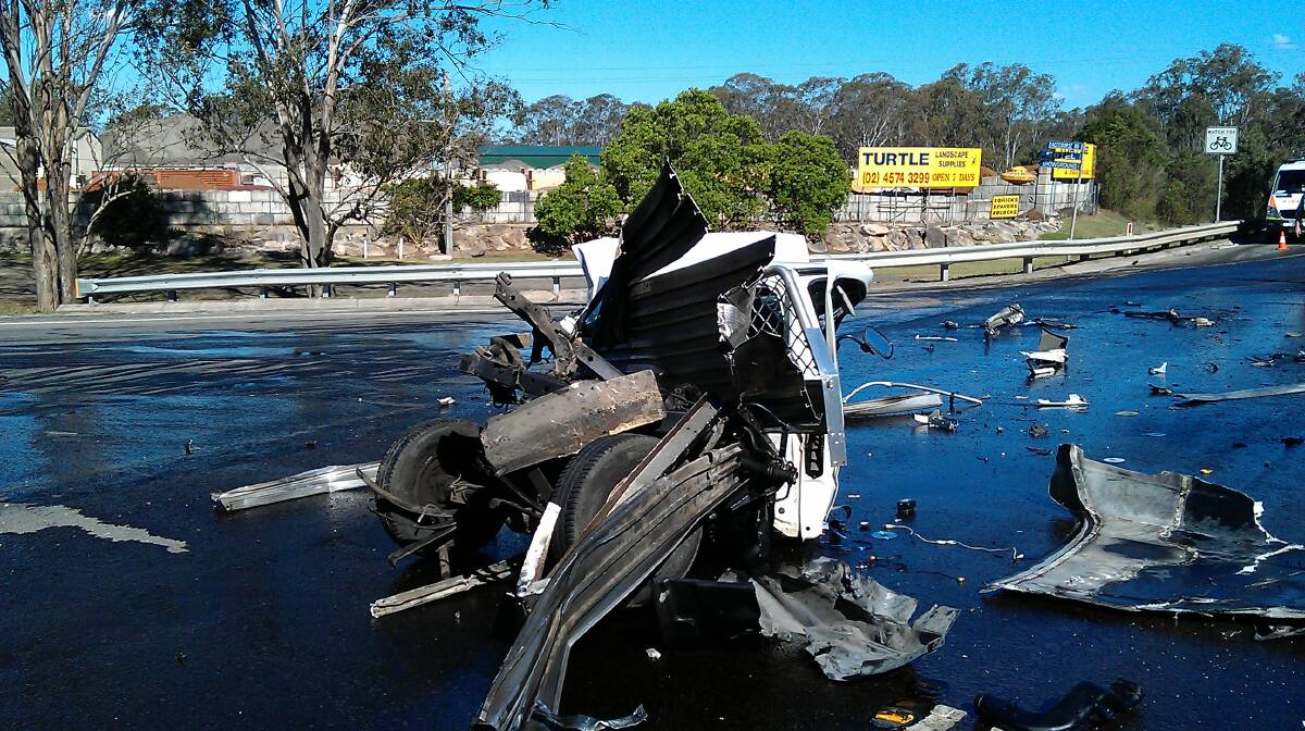 Lucky escape: The driver walks away from a crash on Blacktown Road.