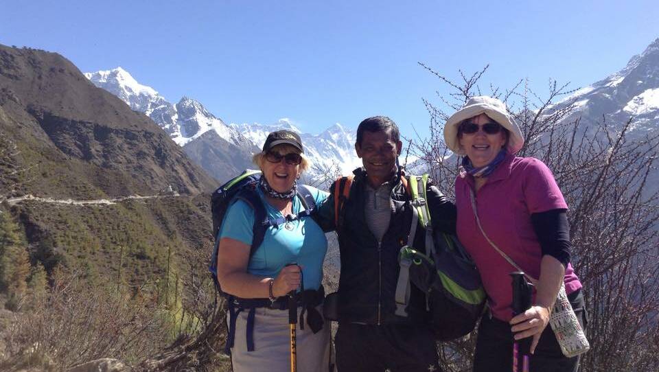 Jessie Windsor, tour guide and Wendy Manning trekking the Himalayas.