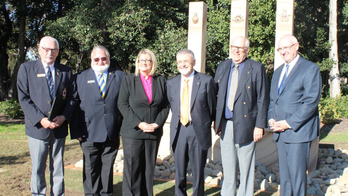 Remembering war veterans from 100 years ago: Richmond RSL Sub-Branch president Ron Gray; Windsor & District RSL Sub-branch president Geoff Brand; federal member for Macquarie Louise Markus; UWS chancellor Professor Peter Shergold; RSL state vice president John Haines and UWS vice chancellor Barney Glover, at the Anzac commemorative memorial at the university’s Hawkesbury campus.